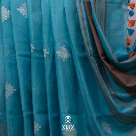 SIAZ LOOM - Sky Blue BHAGALPURI  HANDLOOM LINEN SAREE with Beautiful Off-white Embroidered Pattern with Brown Pallu and Silver Zari Border. Orange coloured Blouse