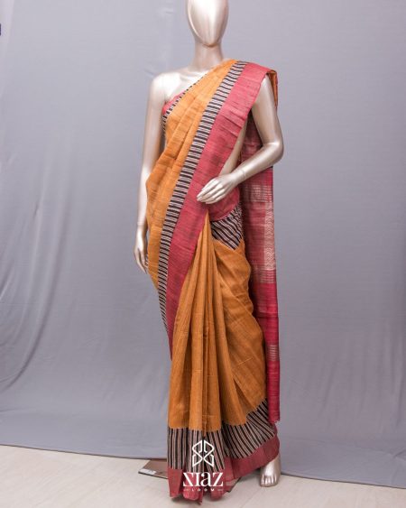 SIAZLOOM Ochre Bhagalpuri Tussar Silk Saree with Black and Beige Stripes towards Borders and Red zari Border and Beige stripes on Red Pallu.